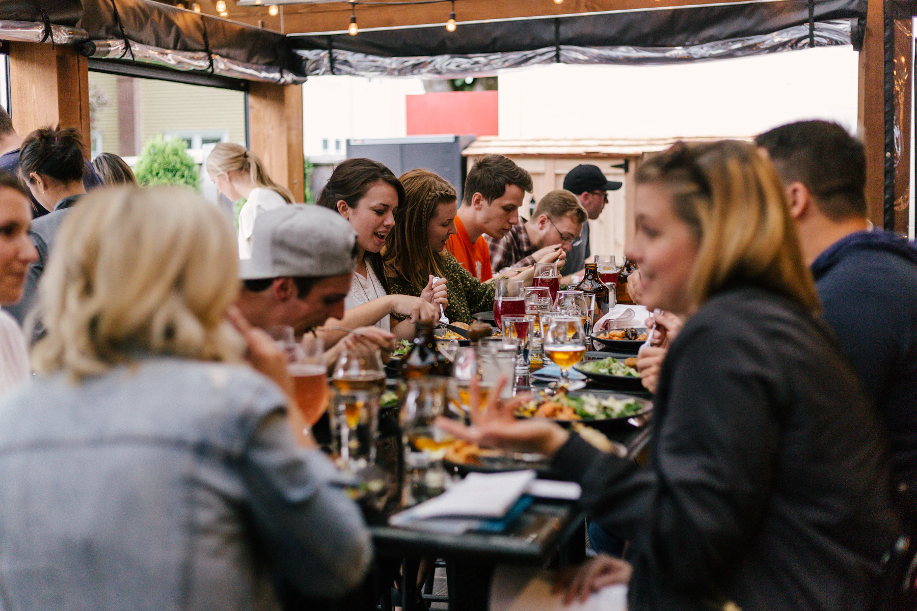 Friends sharing dinner and conversation around a table
